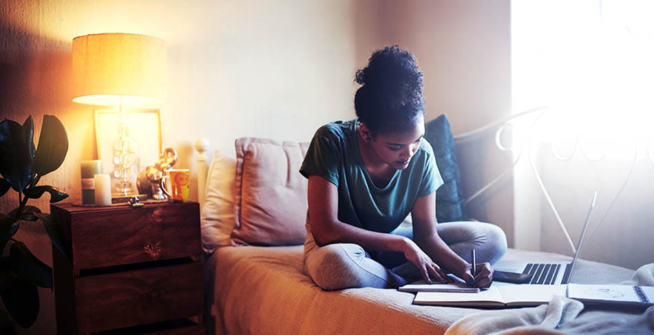 Student on bed